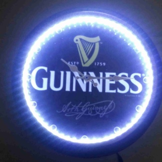 Guinness illuminated clock.