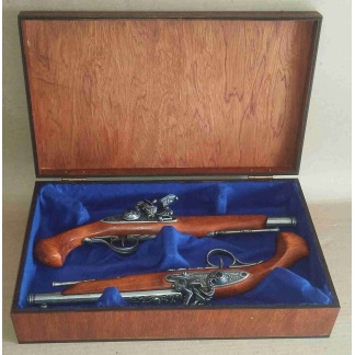 Pair of Dueling pistols in a wooden box. Non functional.. Italy 1825