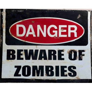 Beware of the Zombies comic used metal sign.