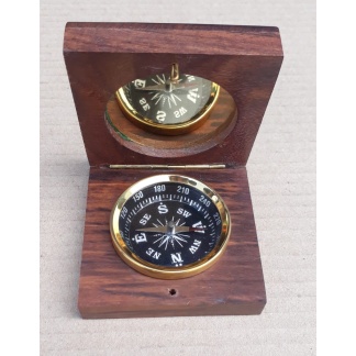Compass fitted in rose wood box.
