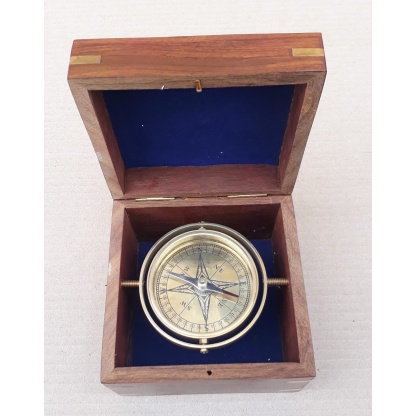 Gimballed compass in a beautiful rosewood box.