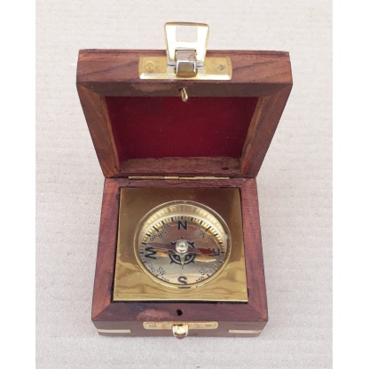 Brass Compass fitted in rose wood box.