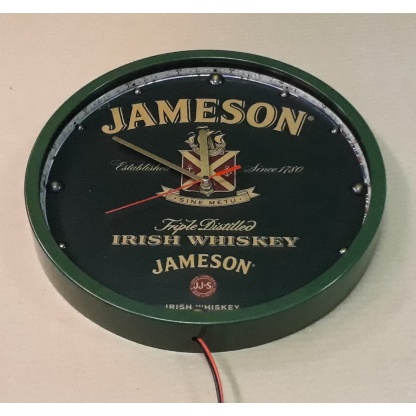 Jameson illuminated clock.