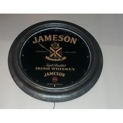 Jameson illuminated clock. 62cm diameter.