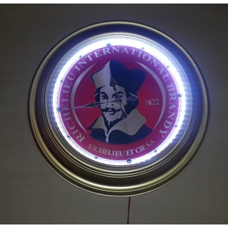 Richelieu illuminated clock. 58cm diameter.