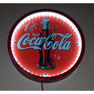 Coca-cola illuminated clock. 30cm diameter.